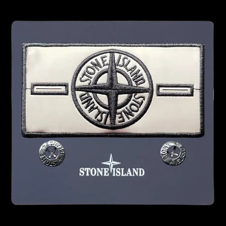 Rear view of white thermal badge